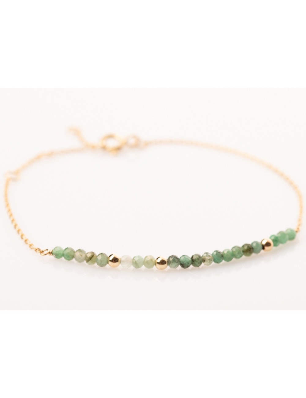 Bracelet en Or jaune 18 carats orné de 16 émeraudes et de 3 boules en Or