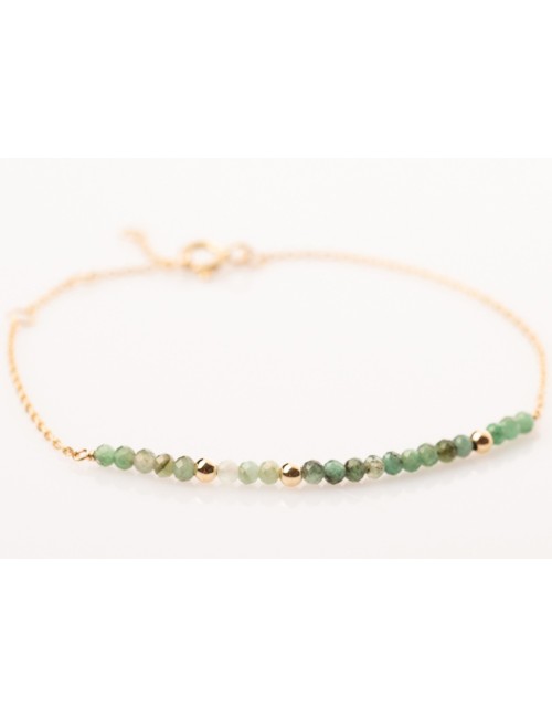 Bracelet en Or jaune 18 carats orné de 16 émeraudes et de 3 boules en Or