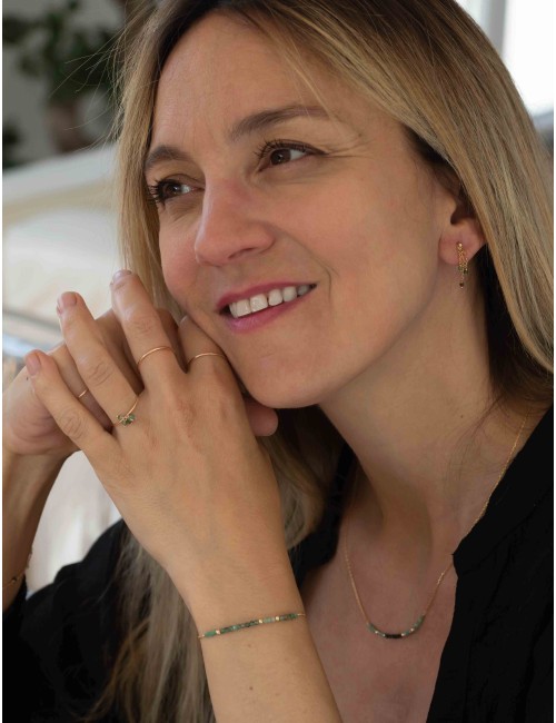 Bracelet en Or jaune 18 carats orné de 16 émeraudes et de 3 boules en Or