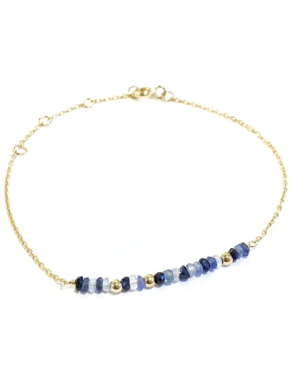 Bracelet en Or jaune 18 carats orné de 16 saphirs et de 3 boules en Or