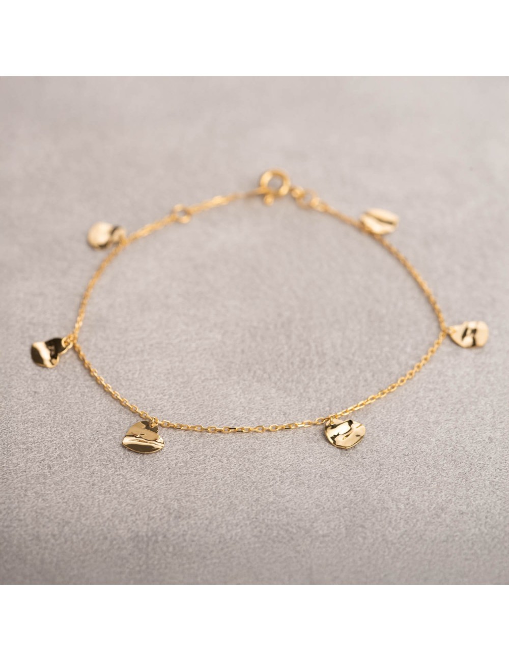 Bracelet ballade de coeurs froissés - Or jaune ou blanc 375 millièmes (9 carats)