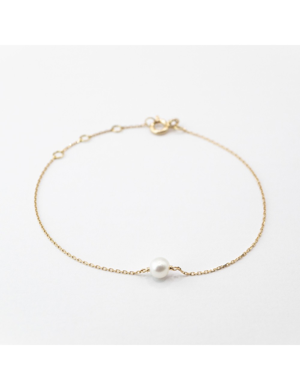 Bracelet mélodie perle d’eau douce - Or jaune ou rose 750 millièmes (18 carats)